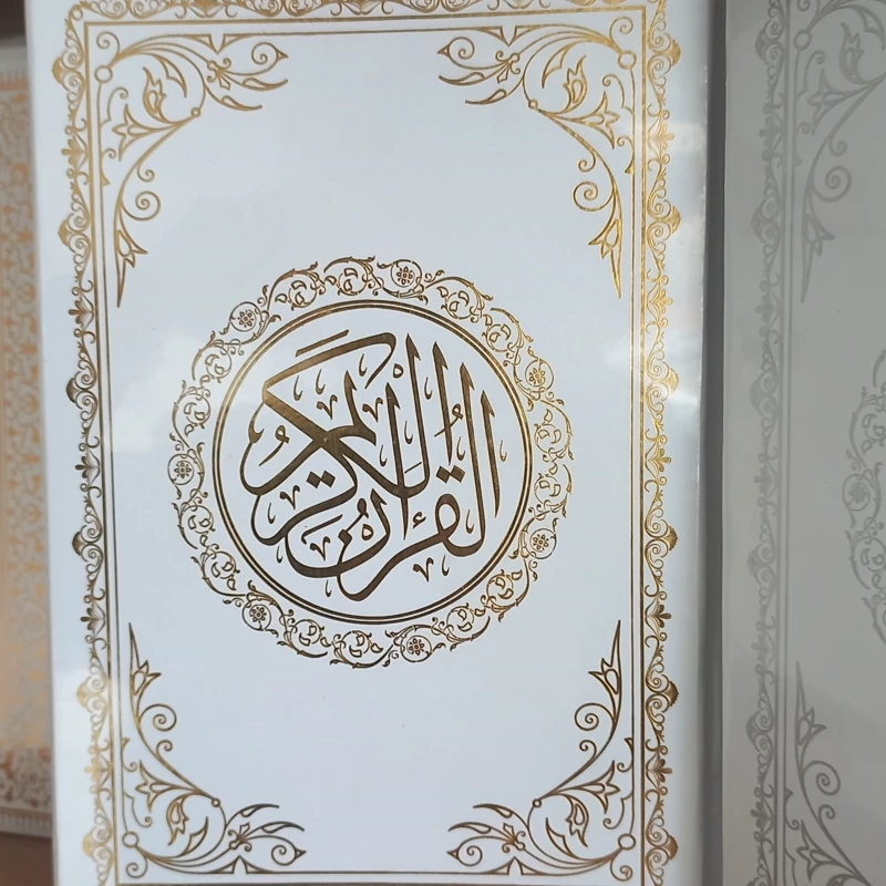 قرآن کریم عثمان طه 10 جلد طلاکوب و نقره کوب وزیری