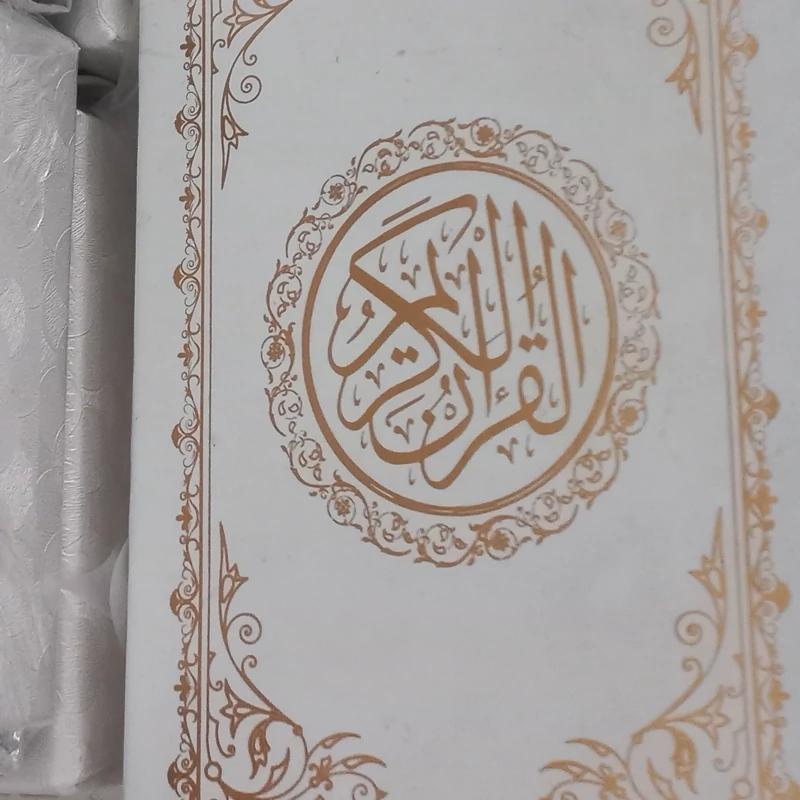 قرآن کریم عثمان طه 10 جلد طلاکوب و نقره کوب وزیری