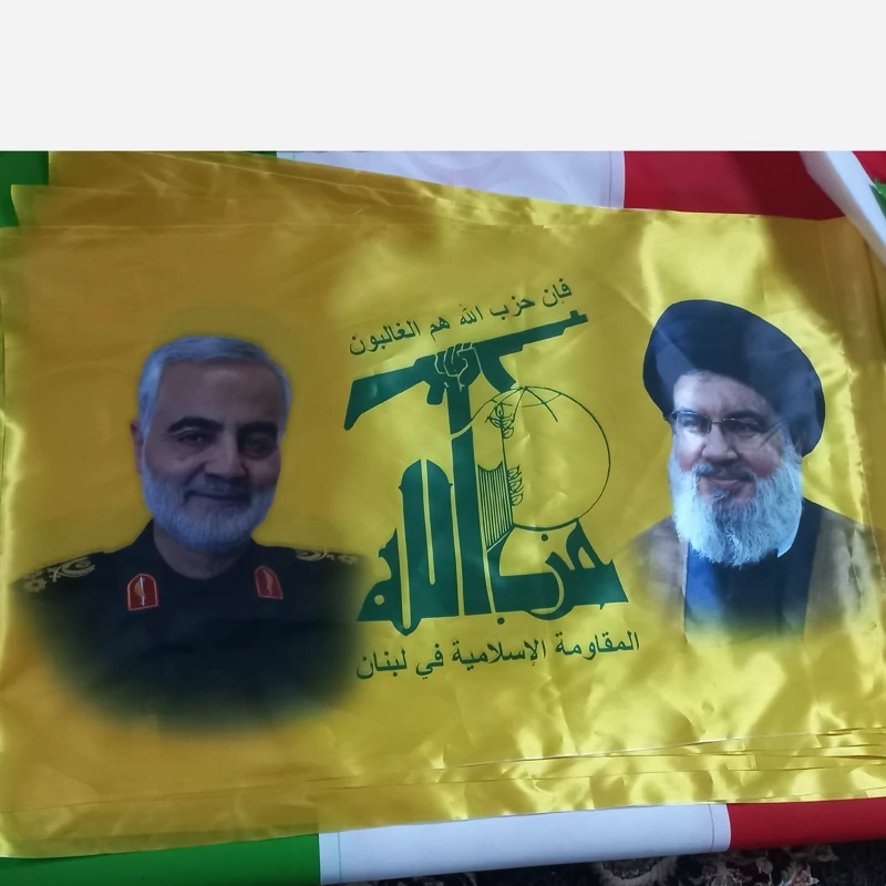 پرچم حزب الله با تصویر نصرالله و حاج قاسم