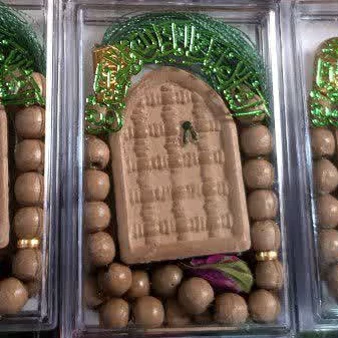 مهر و تسبیح دخیل و گل محمدی سوغات